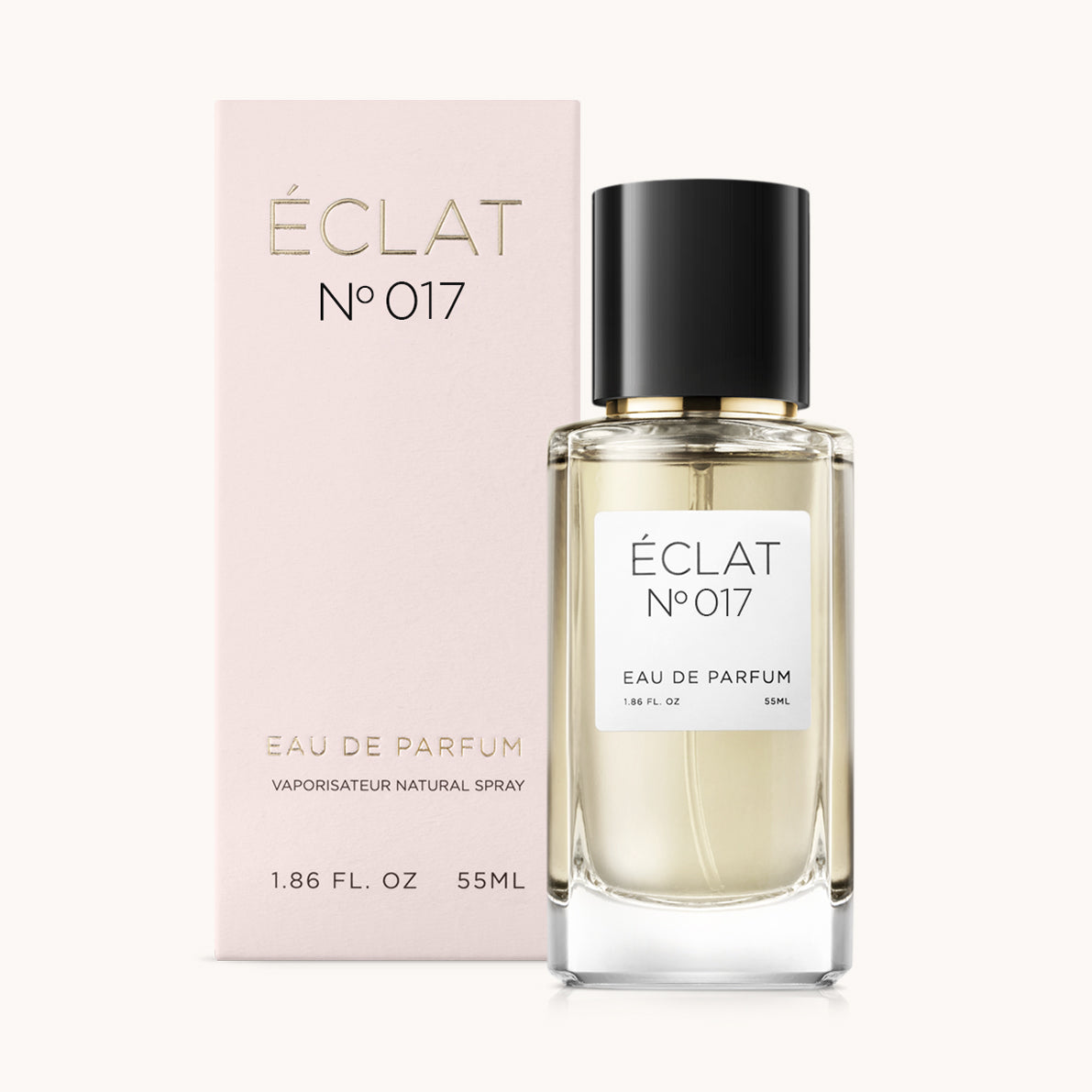 ÉCLAT No. 017 perfume bottle with matching light pink packaging. The elegant glass flacon features a black cylindrical magnetic cap and a simple white label with the inscription ÉCLAT No. 017 and “Eau de Parfum”.