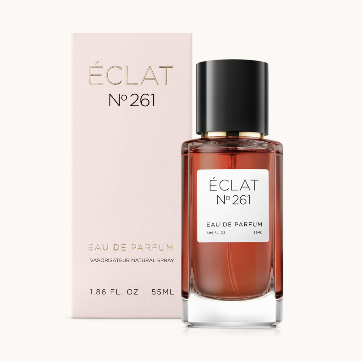 ÉCLAT No. 261 perfume bottle with matching light pink packaging. The elegant glass flacon features a black cylindrical magnetic cap and a simple white label with the inscription ÉCLAT No. 261 and “Eau de Parfum”.