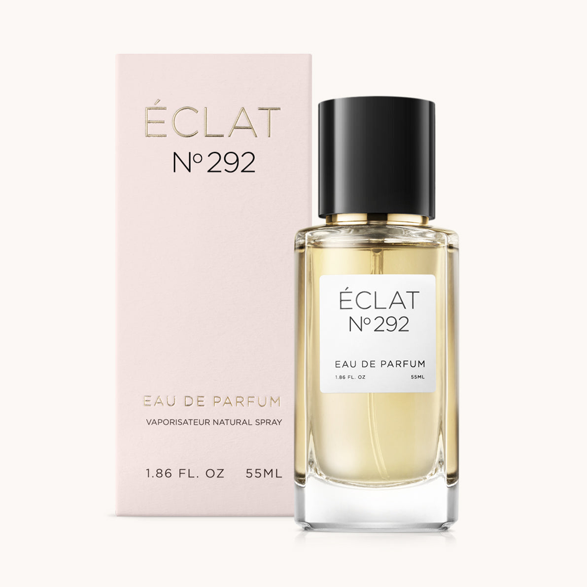 ÉCLAT No. 292 perfume bottle with matching light pink packaging. The elegant glass flacon features a black cylindrical magnetic cap and a simple white label with the inscription ÉCLAT No. 292 and “Eau de Parfum”.