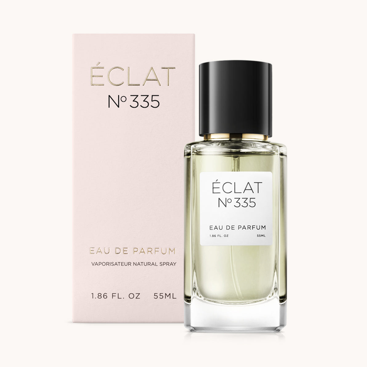 ÉCLAT No. 335 perfume bottle with matching light pink packaging. The elegant glass flacon features a black cylindrical magnetic cap and a simple white label with the inscription ÉCLAT No. 335 and “Eau de Parfum”.
