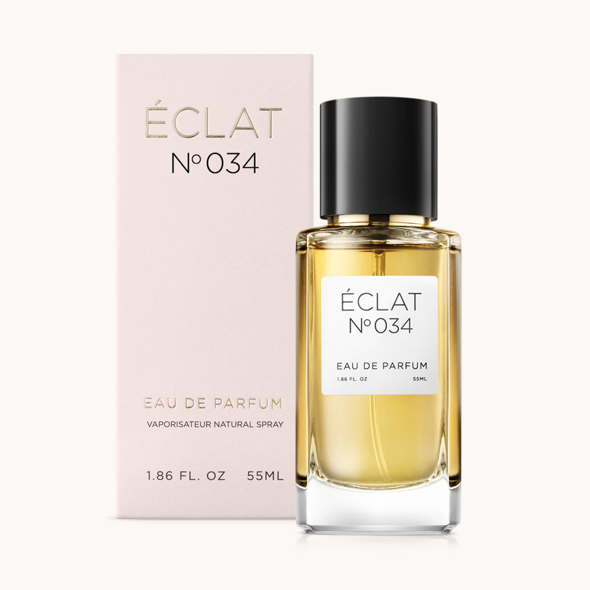 ÉCLAT No. 034 perfume bottle with matching light pink packaging. The elegant glass flacon features a black cylindrical magnetic cap and a simple white label with the inscription ÉCLAT No. 034 and “Eau de Parfum”.