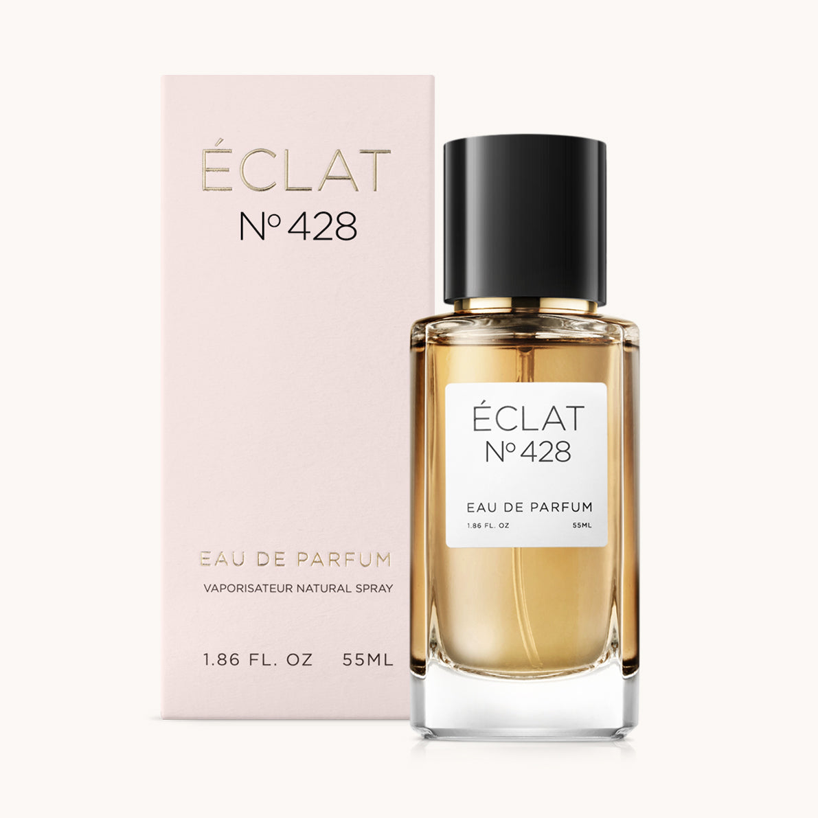 ÉCLAT No. 428 fragrance bottle with matching light pink packaging. The elegant glass flacon features a black cylindrical magnetic cap and a simple white label with the inscription ÉCLAT No. 428 and “Eau de Parfum”.