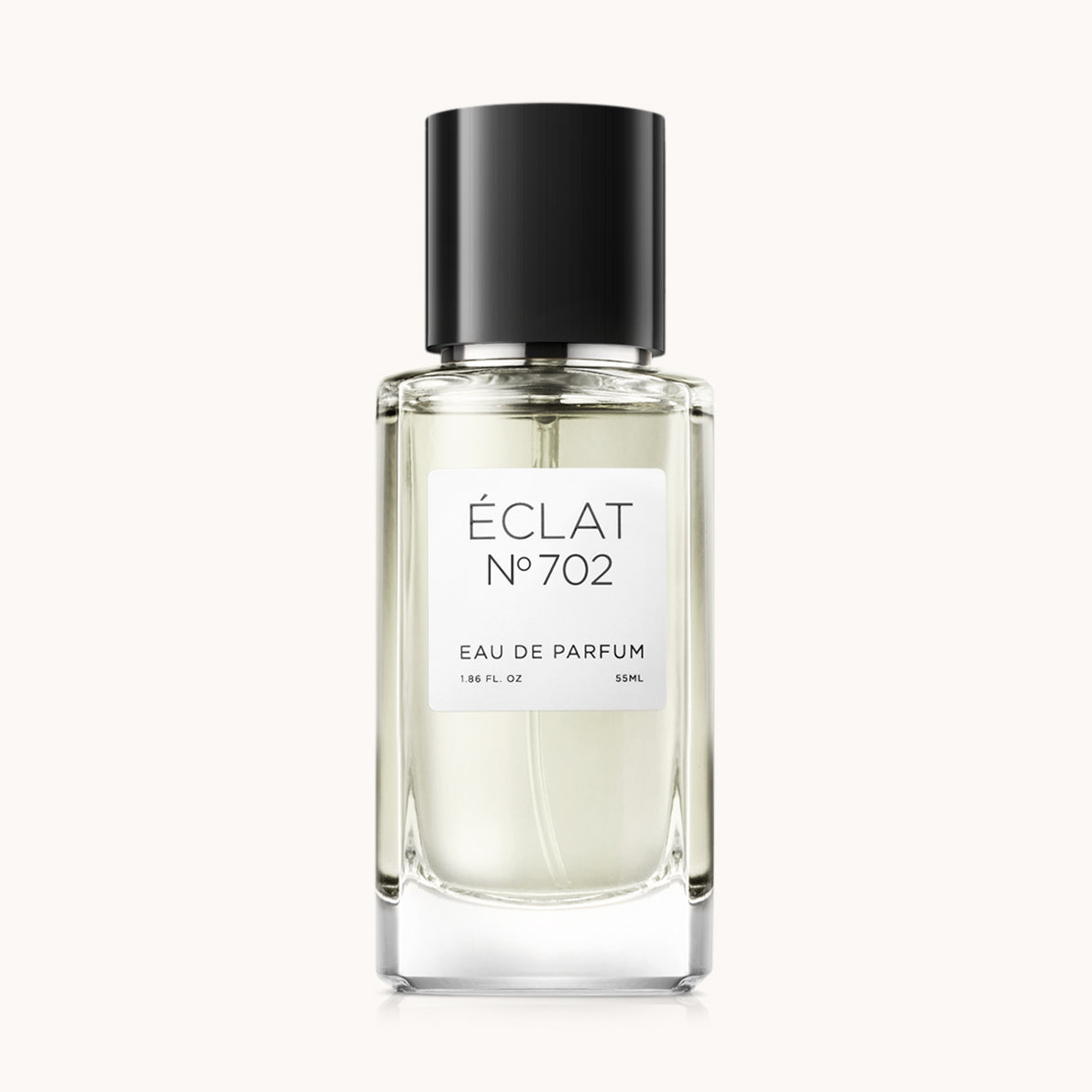 Flacon of the men’s perfume dupe ÉCLAT No. 702, an elegant transparent glass bottle with a black cylindrical magnetic cap and a minimalist white label. The label displays the brand name ÉCLAT, the number 702, and the phrase “Eau de Parfum”.
