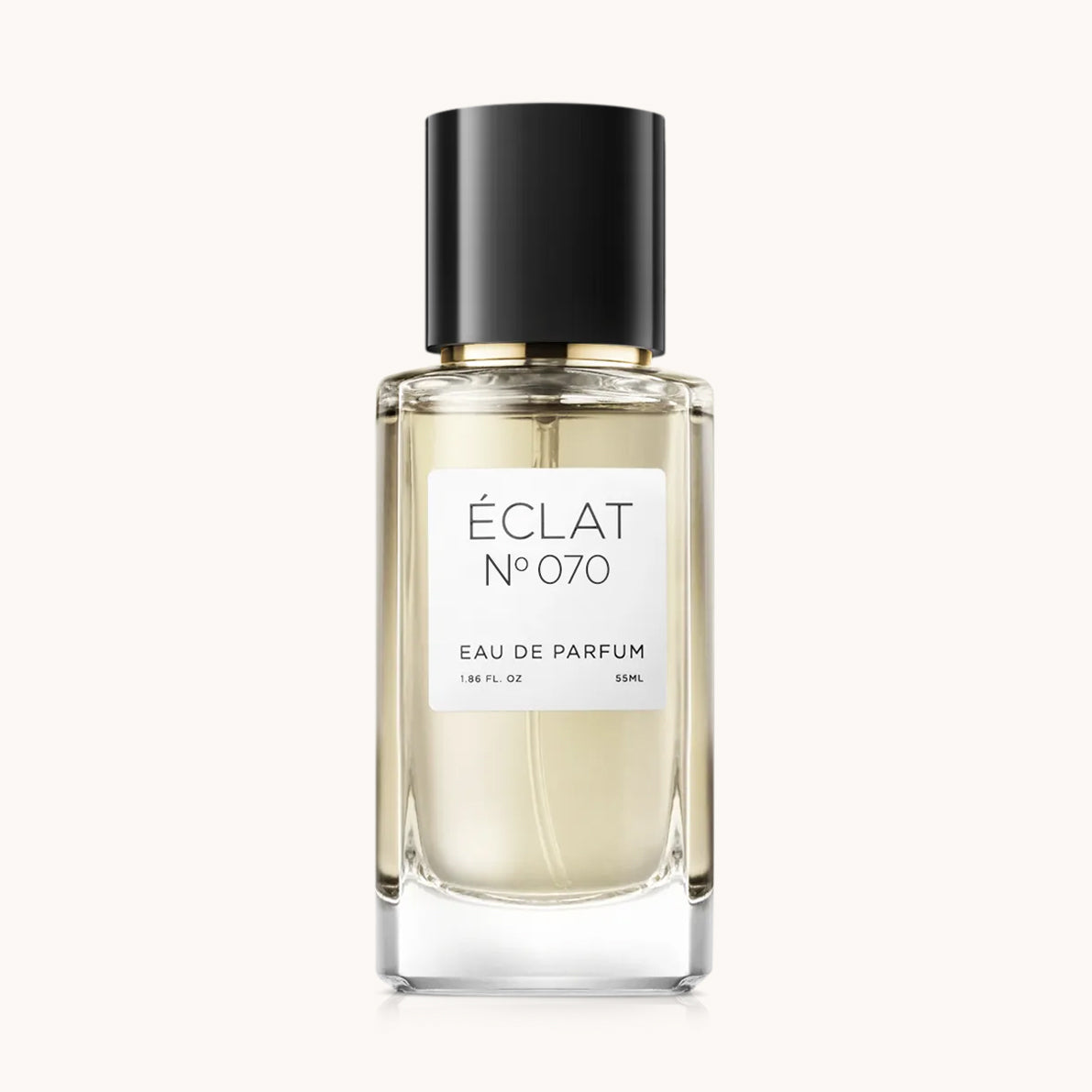 Flacon of the women's perfume dupe ÉCLAT No. 070, an elegant transparent glass bottle with a black cylindrical magnetic cap and a white label. The label features the brand name ÉCLAT, the number 070, and the words “Eau de Parfum”.