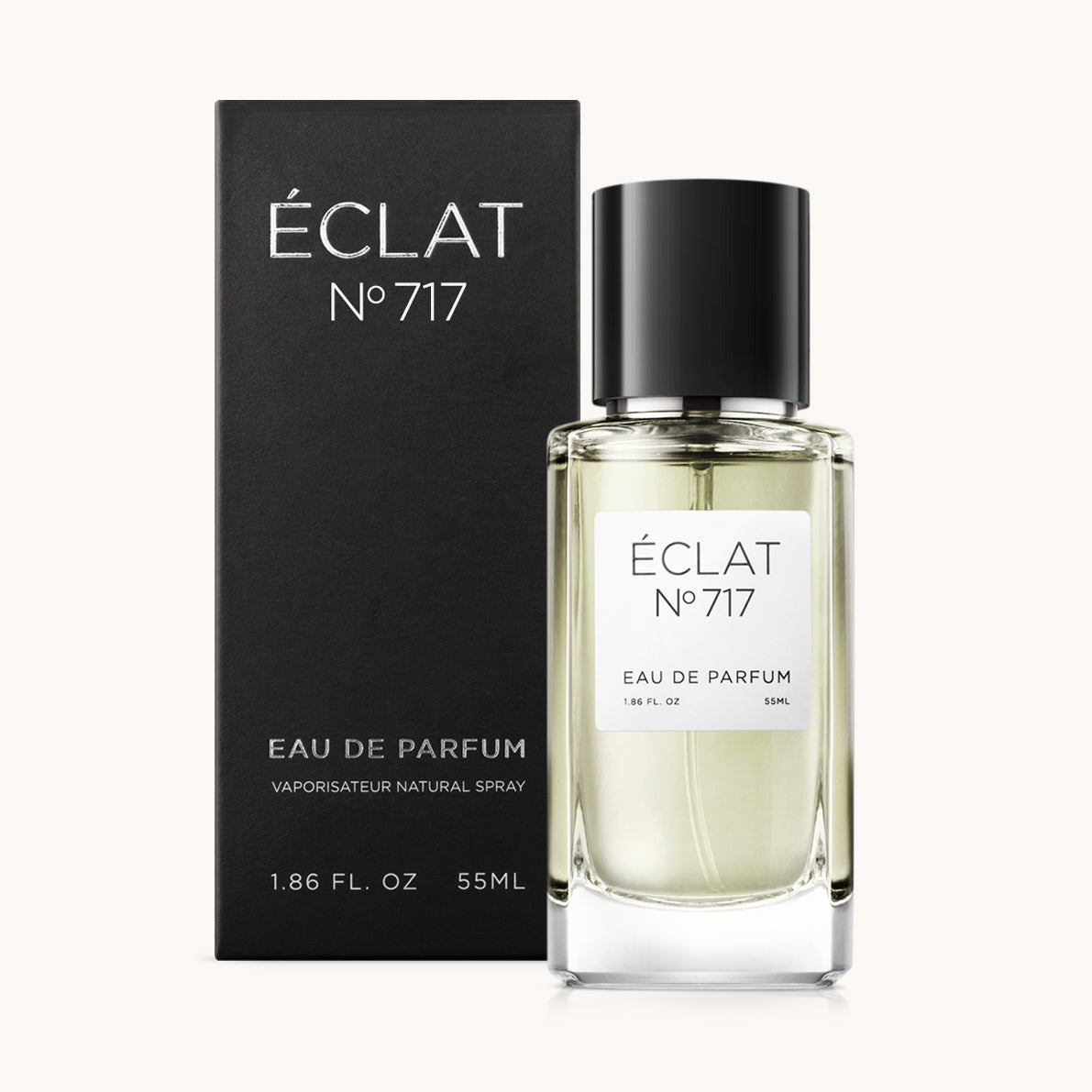 Flacon of the men’s perfume dupe ÉCLAT No. 717, an elegant transparent glass bottle with a black cylindrical magnetic cap and a minimalist white label. The label displays the brand name ÉCLAT, the number 717, and the phrase “Eau de Parfum”.