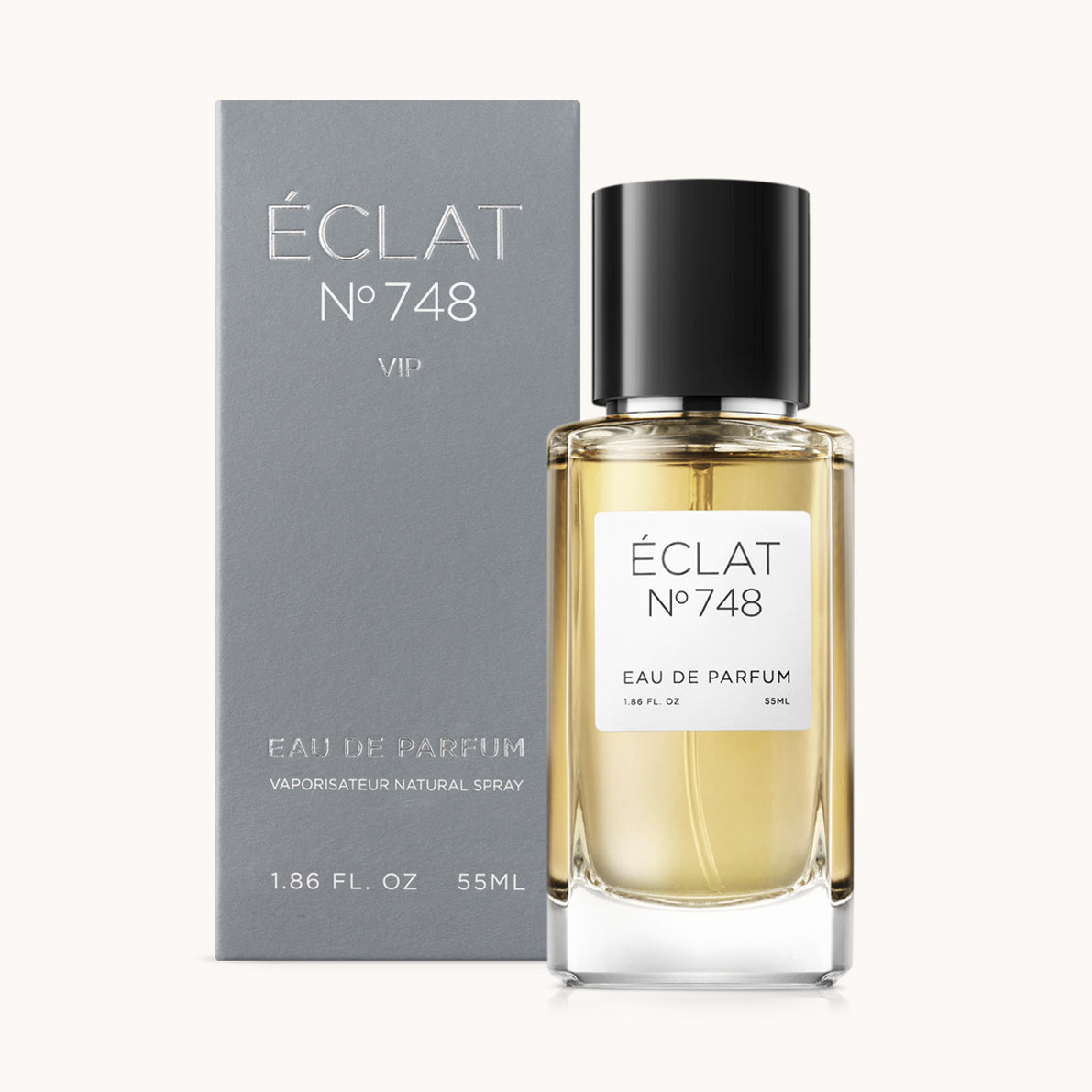 Flacon of the men’s perfume dupe ÉCLAT No. 748 VIP, an elegant transparent glass bottle with a black cylindrical magnetic cap and a minimalist white label. The label displays the brand name ÉCLAT, the number 748 VIP, and the phrase “Eau de Parfum”.