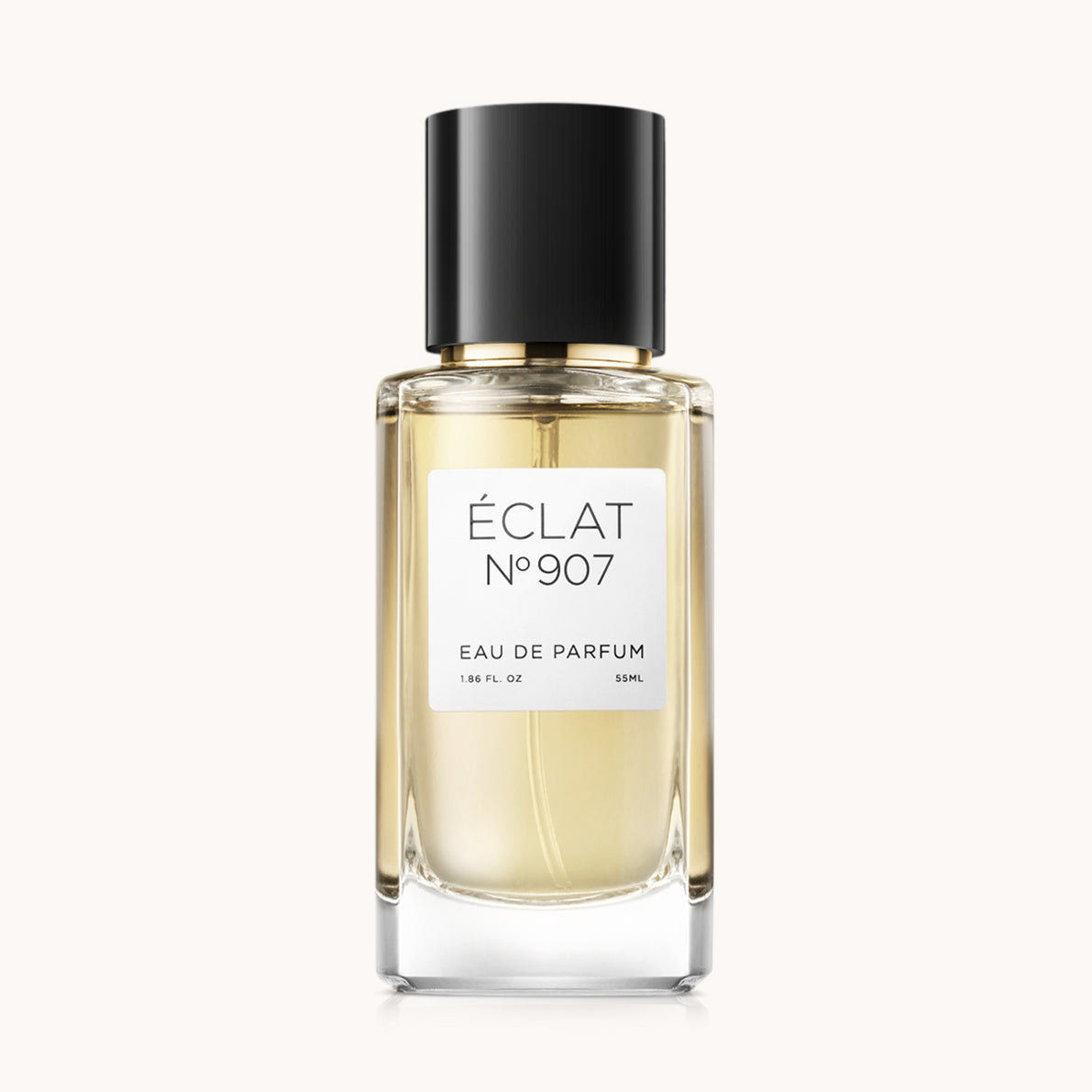 Flacon of the unisex fragrance dupe ÉCLAT No. 907, an elegant transparent glass bottle with a black cylindrical magnetic cap and a minimalist white label. The label displays the brand name ÉCLAT, the number 907, and the phrase “Eau de Parfum”.