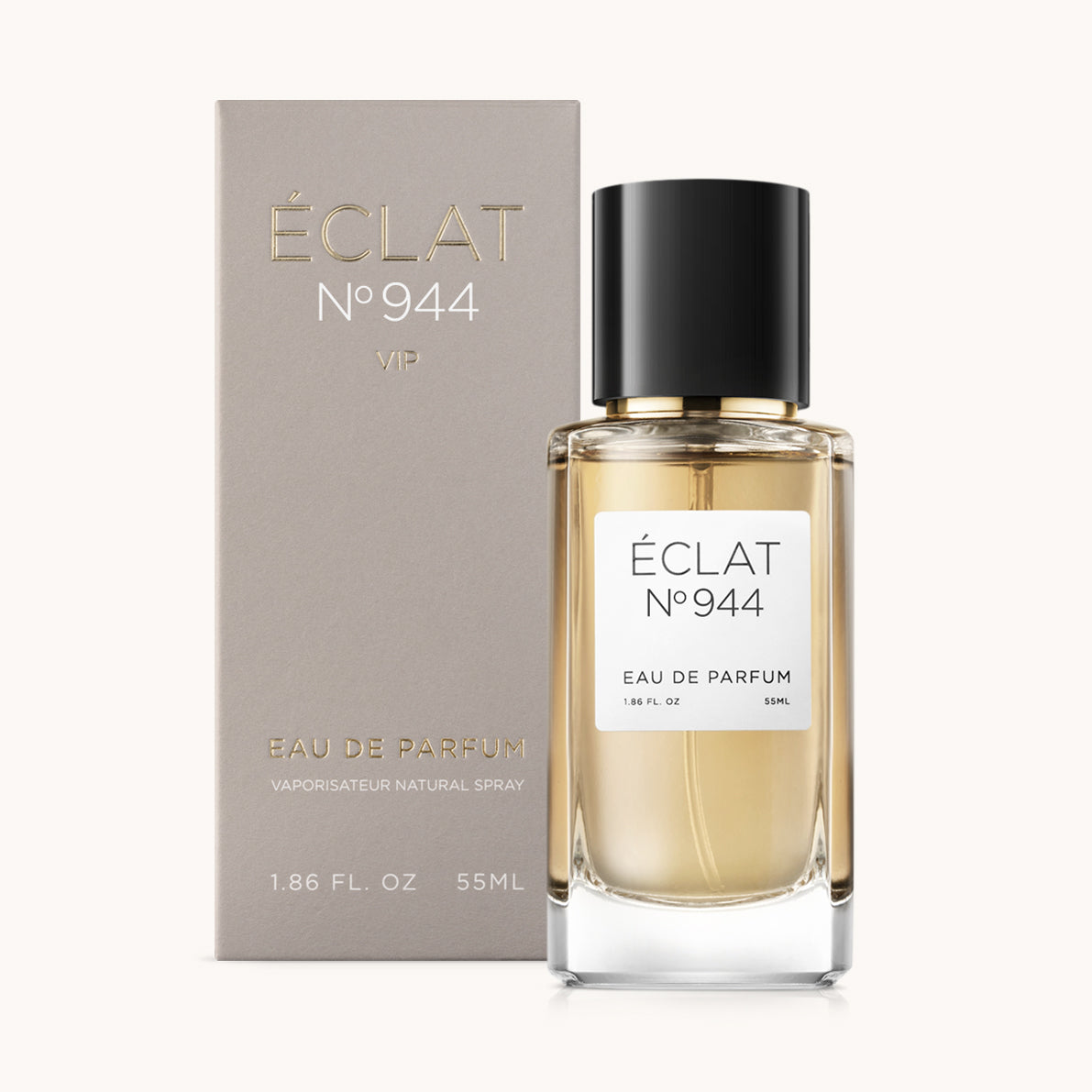 ÉCLAT No. 944 VIP unisex fragrance bottle with matching taupe beige packaging. The elegant flacon features a black cylindrical magnetic cap and a clean white label with the inscription ÉCLAT No. 944 VIP and “Eau de Parfum”.