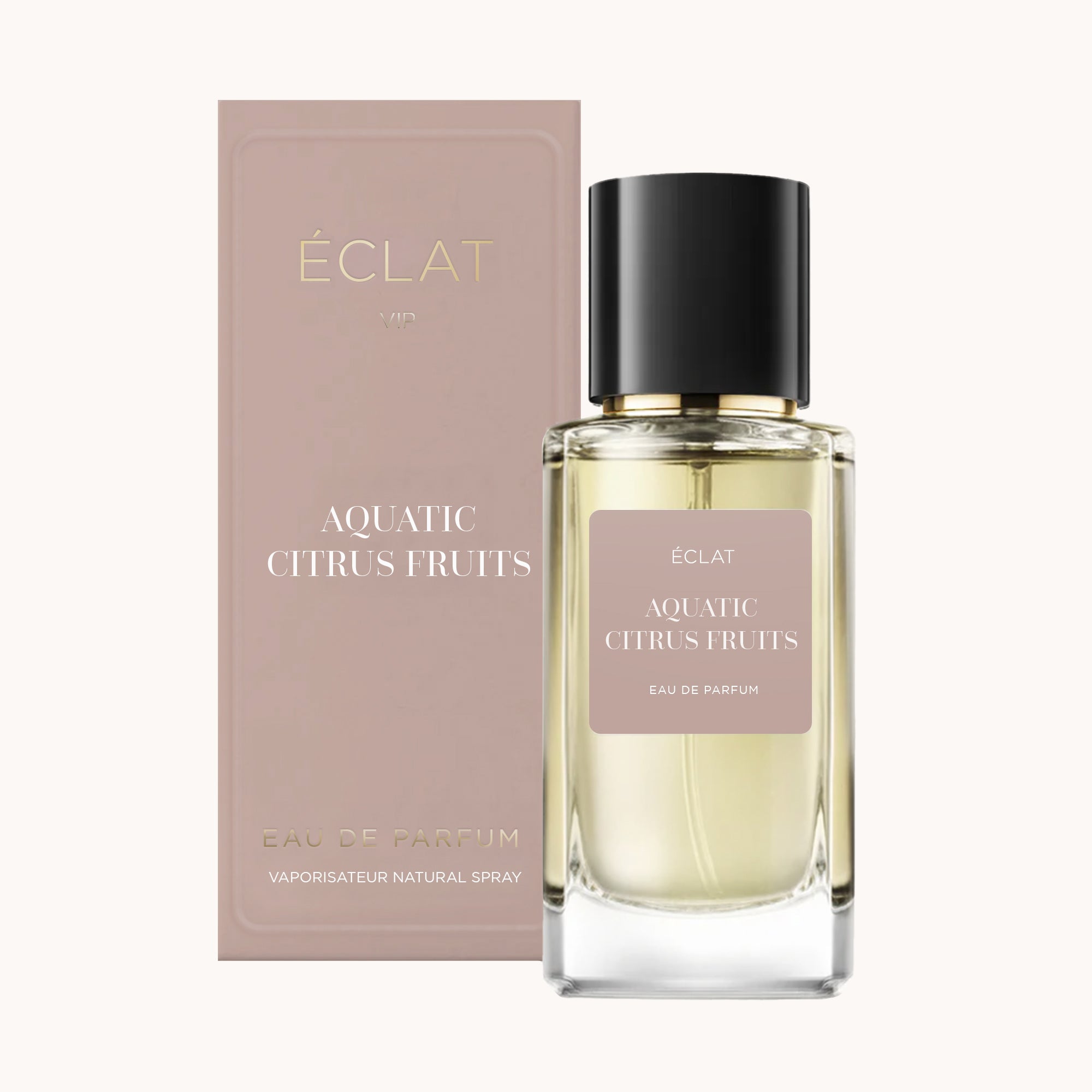 A faceted glass bottle of ÉCLAT Aquatic Citrus Fruits with a black cap, alongside a matching colored presentation box.