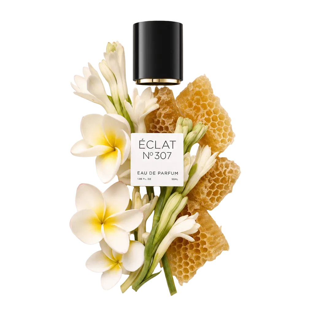 Arrangement of white flowers and honeycomb surrounding a black cap with ÉCLAT Floral Beeswax label.