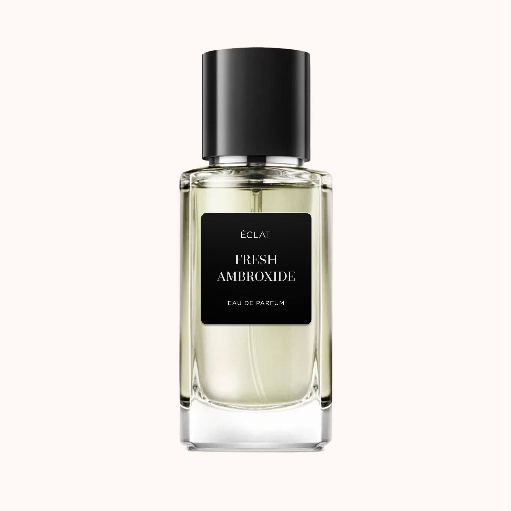 Faceted glass bottle with a black matte label and matching cap, featuring ÉCLAT Fresh Ambroxide.