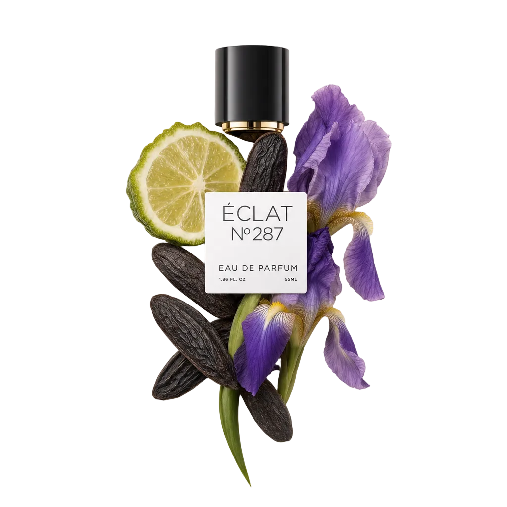 Μια σύνθεση συστατικών αρώματος για το ÉCLAT Oriental Iris με μια φέτα λάιμ, κόκκους τόνκας και μοβ ίριδες, με ένα μαύρο καπάκι και ετικέτα.