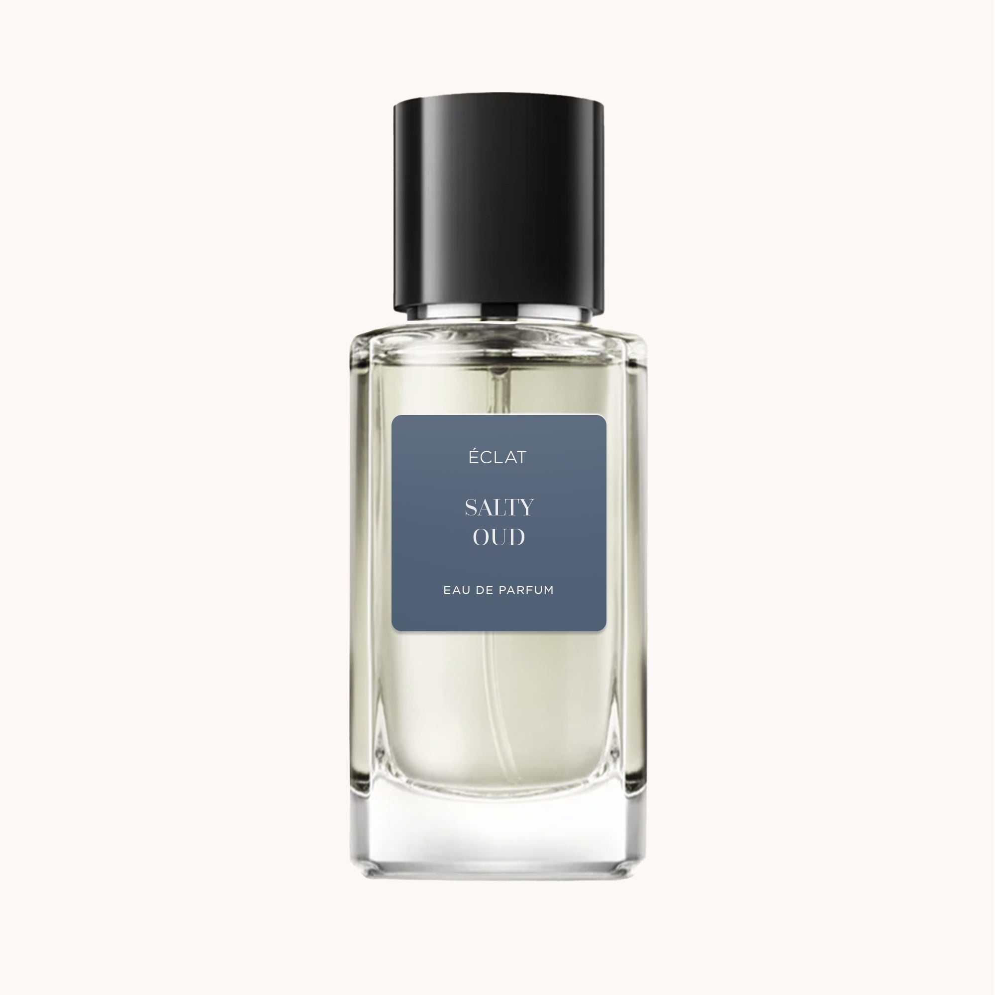 Frasco de vidro transparente de ÉCLAT Salty Oud com tampa preta e rótulo cinza mate.