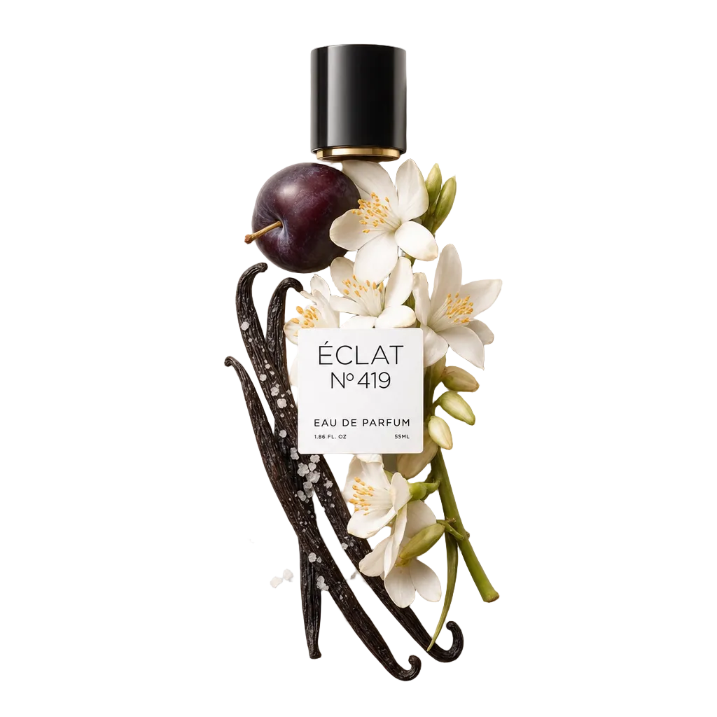 An elegant arrangement of a ripe plum, vanilla pods, white flowers, and sea salt crystals surrounds the ÉCLAT 419 black cap with label.