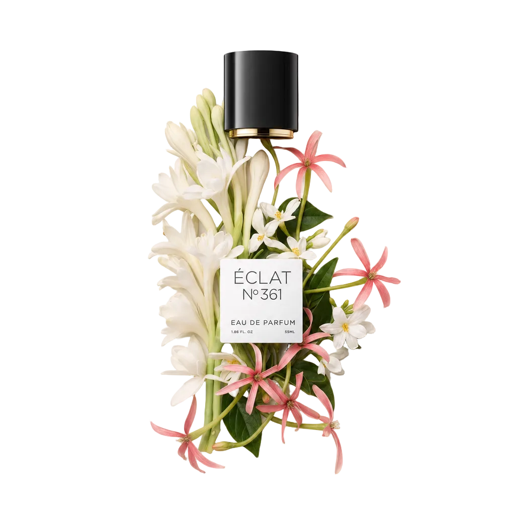 Un arrangement de tubéreuses blanches et de jasmin rose entoure un bouchon noir avec étiquette ÉCLAT Tuberose & Jasmine.