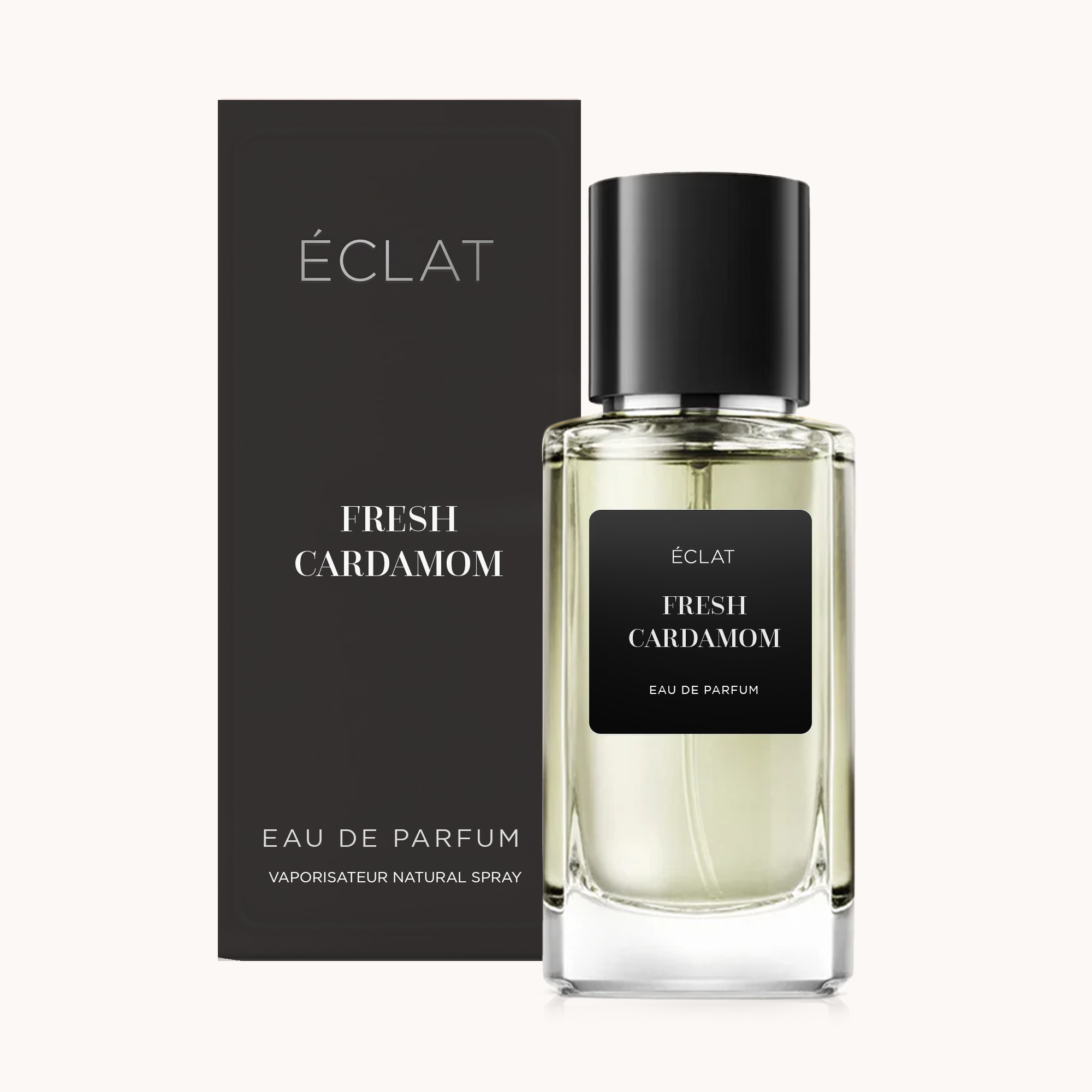 Μπουκάλι αρώματος ÉCLAT Fresh Cardamom με μαύρη ετικέτα και καπάκι, δίπλα σε μαύρο κουτί.