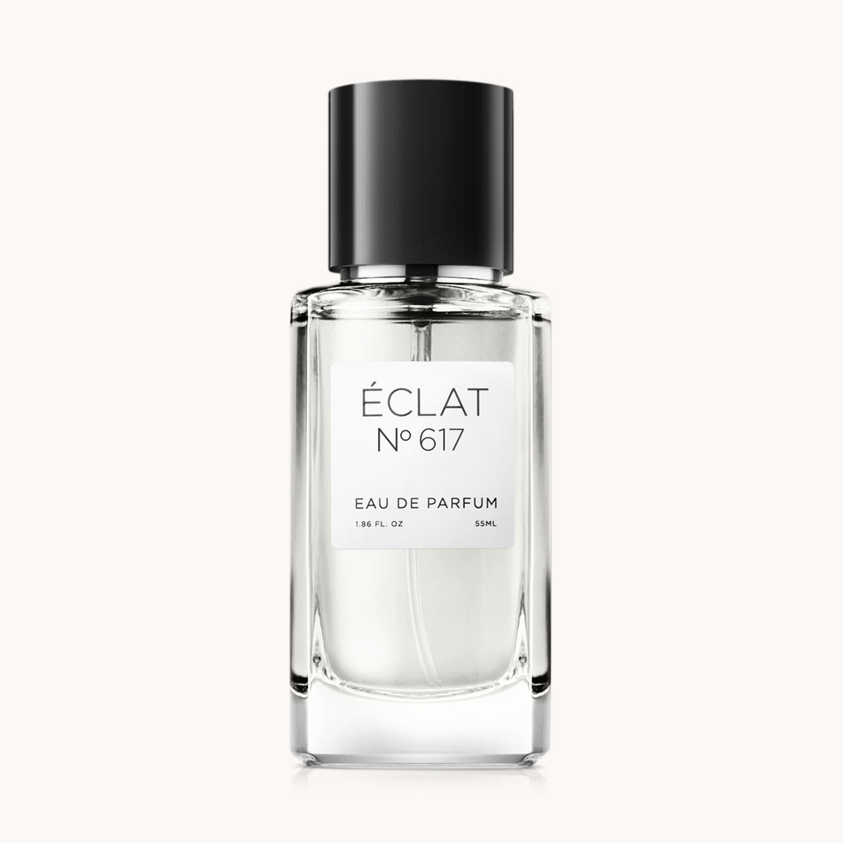 Un flacon en verre clair avec un bouchon noir présente ÉCLAT Ambery Dates Eau de Parfum.