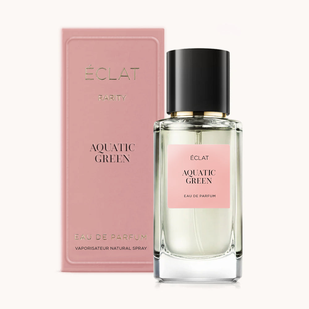 ÉCLAT Aquatic Green RAR in a clear glass bottle with a black cap, accompanied by a pink box featuring elegant branding.