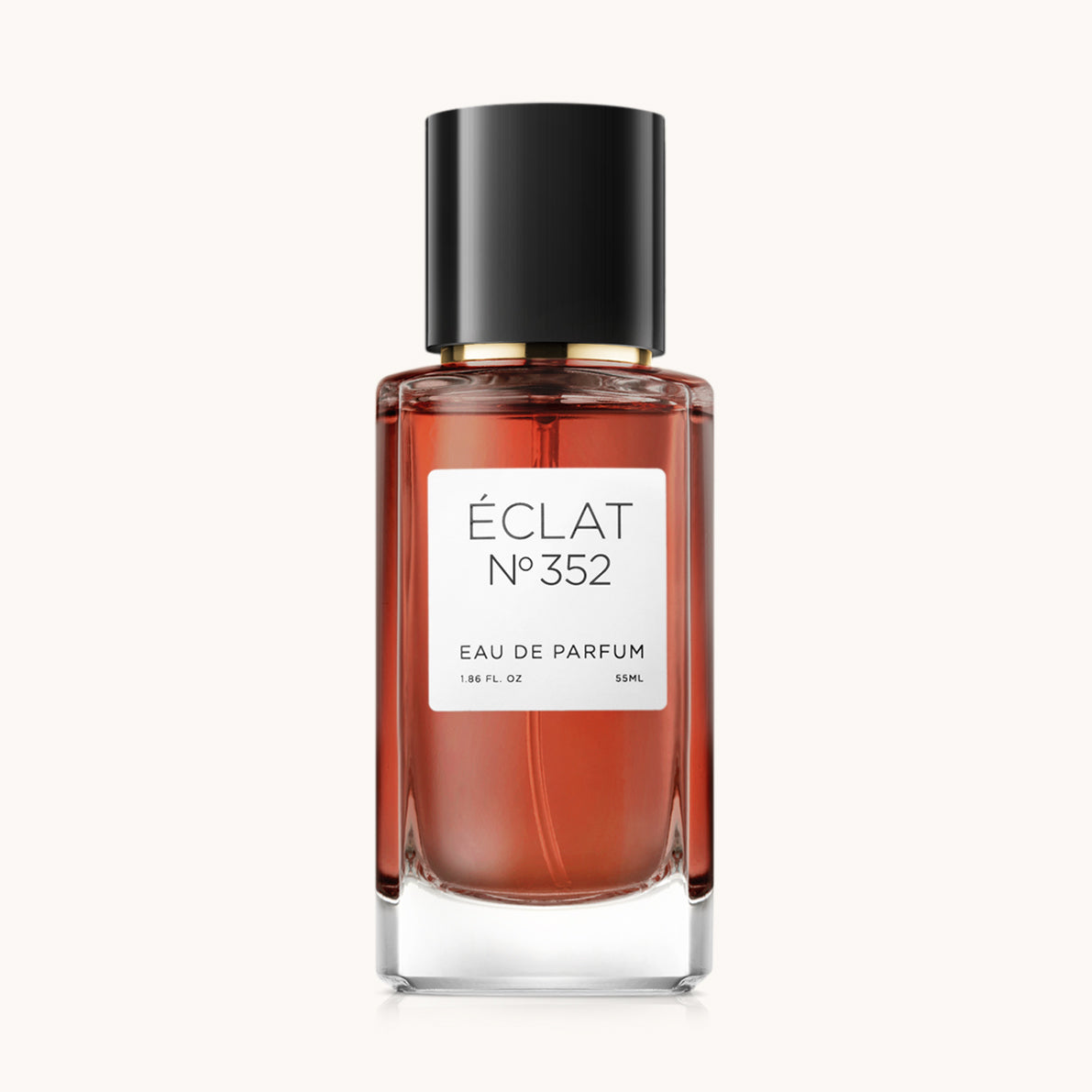 ÉCLAT Cherry Blossom Amaretto fragrance in a clear glass bottle with a black cap and white label.