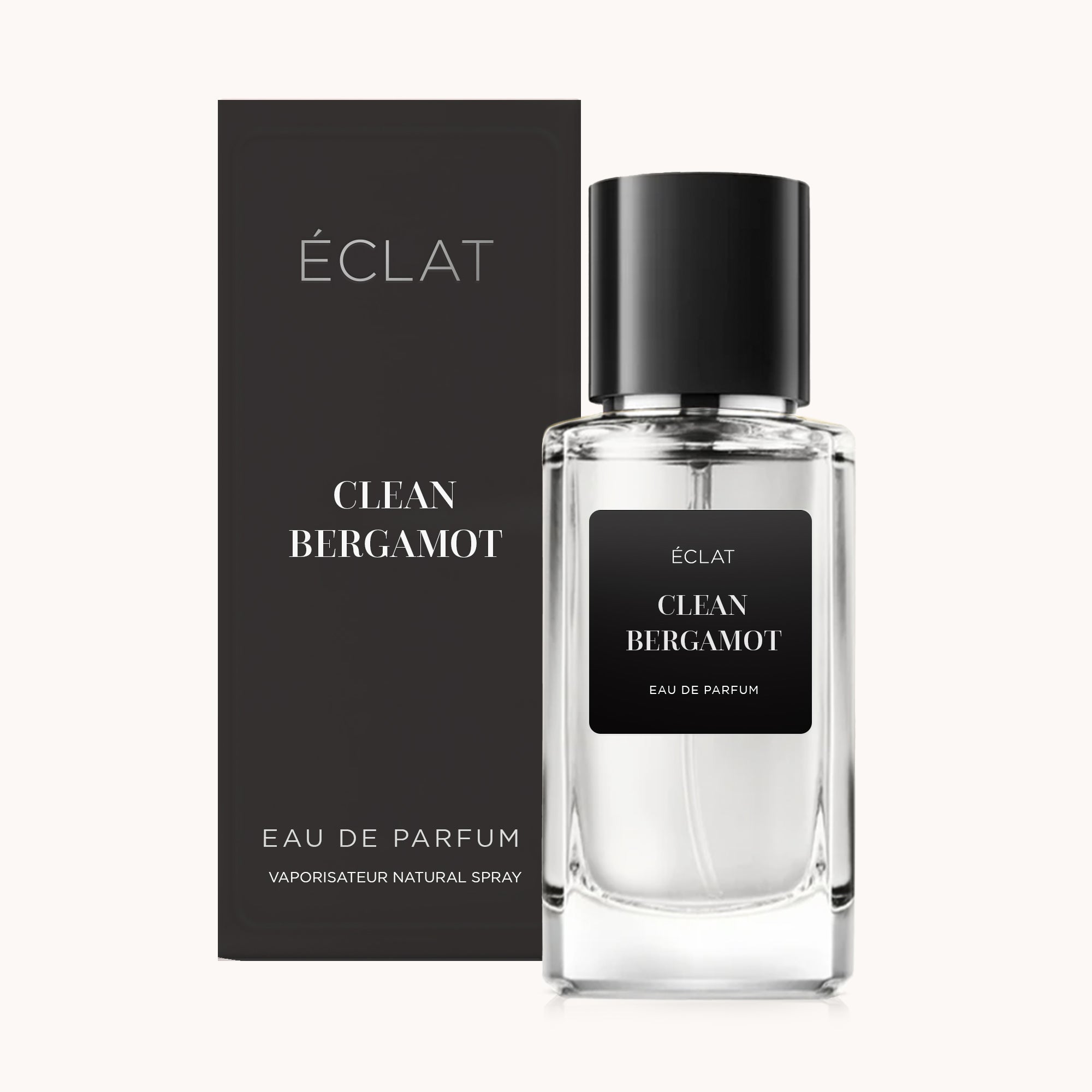 Sofisticado frasco de vidrio con etiqueta negra y tapa negra a juego, junto a su caja elegantemente diseñada en acabado negro mate, presentando ÉCLAT Clean Bergamot.