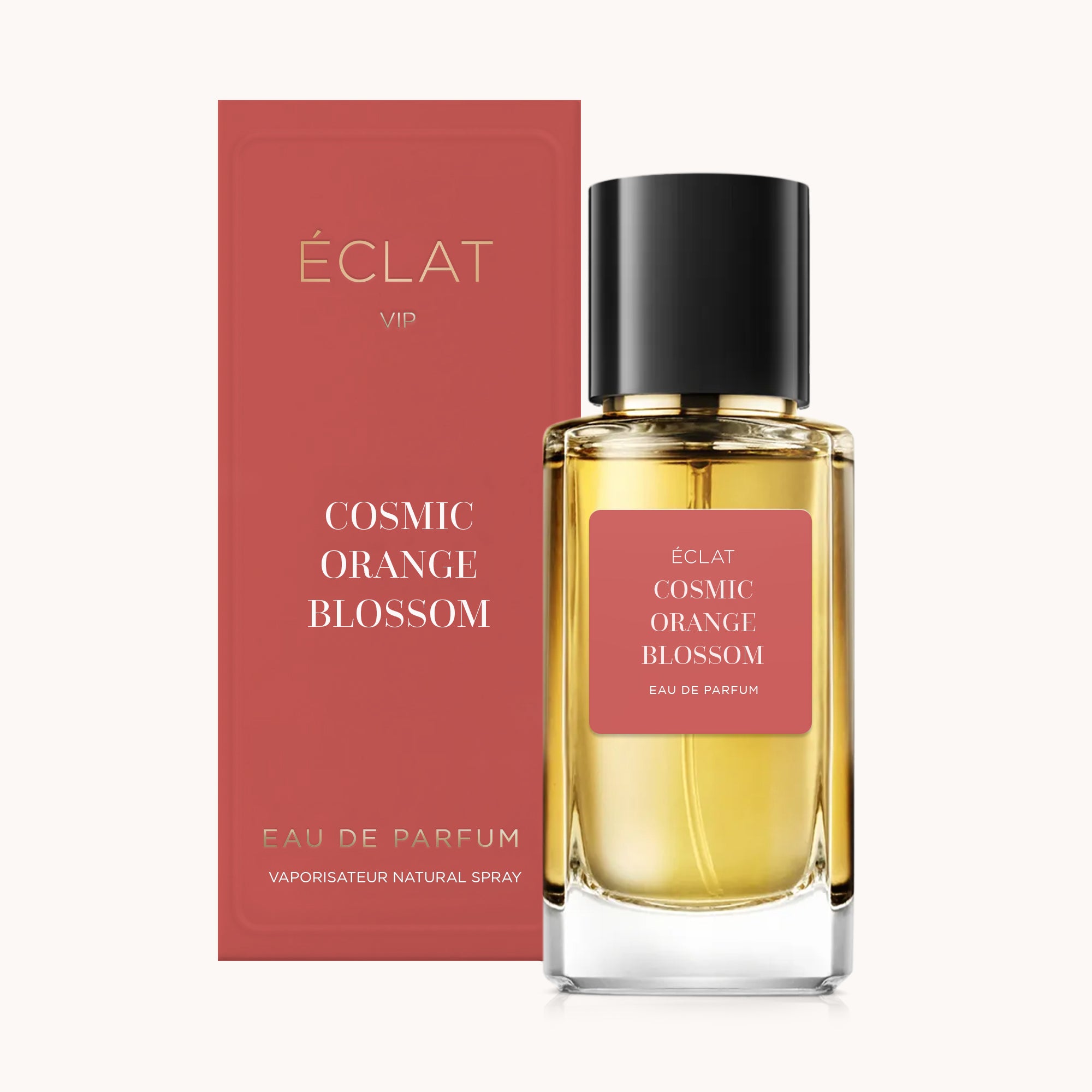 Elegant glass flacon with a dark cap alongside a matching box, both featuring ÉCLAT Cosmic Orange Blossom labeling.