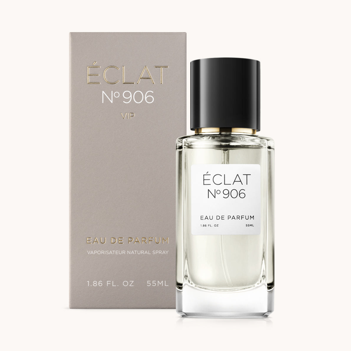 Κομψό γυάλινο μπουκάλι ÉCLAT Creamy Ylang-Ylang με μαύρο καπάκι, συνοδευόμενο από ένα γκρι κουτί παρουσίασης.