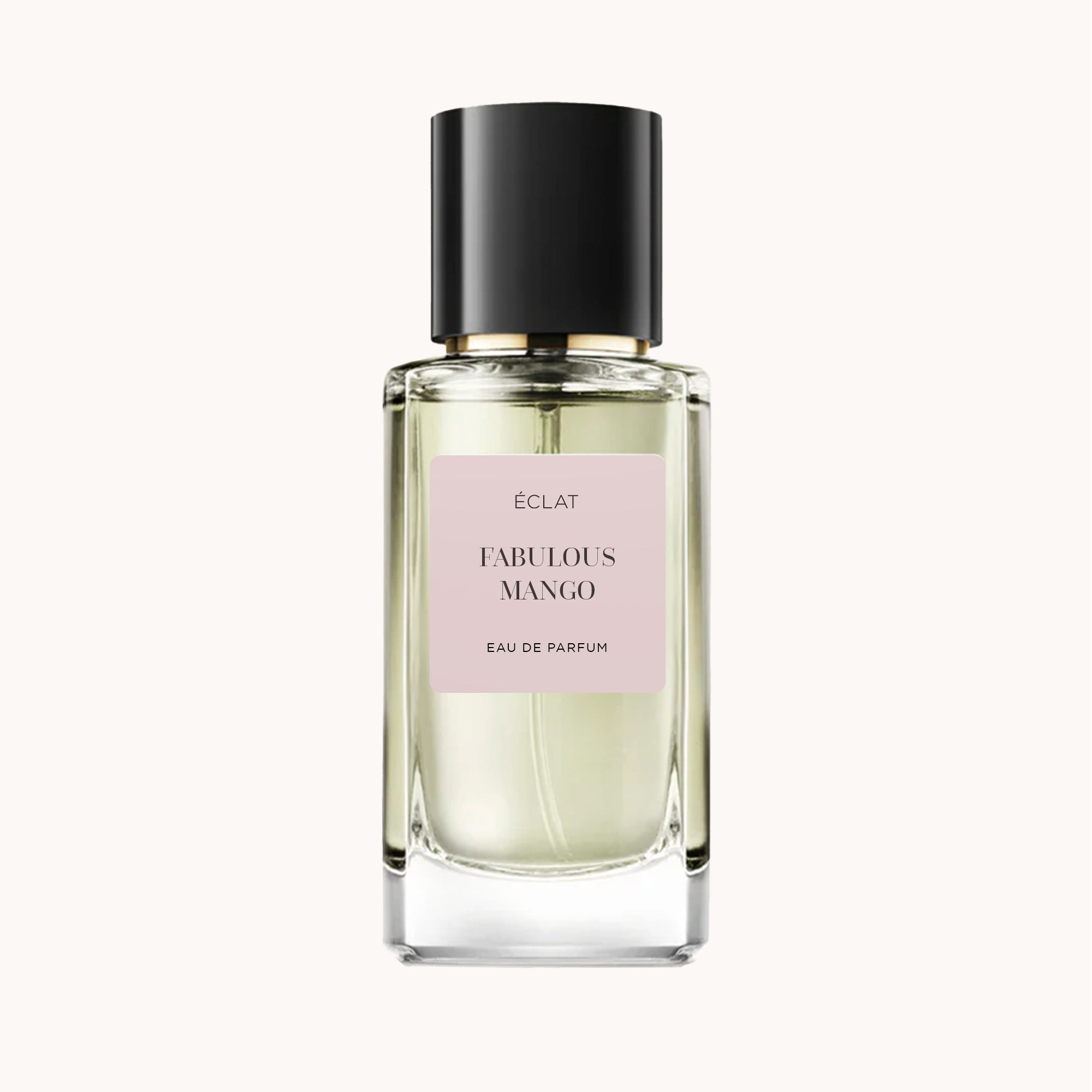 ÉCLAT Fabulous Mango in a clear faceted glass bottle with a pastel label and a black cap.