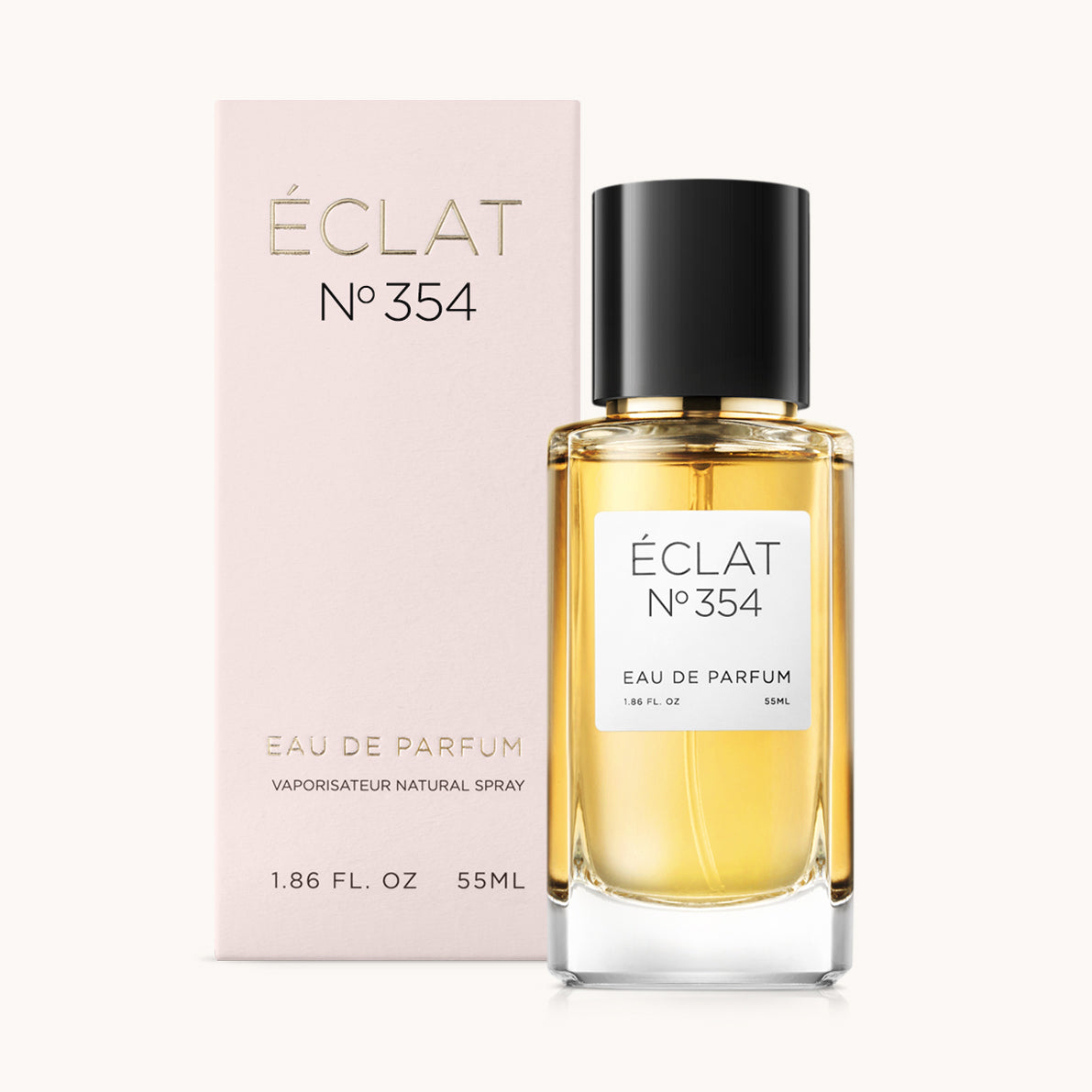 ÉCLAT Floral Ginger parfumfles met zwarte dop en lichtroze doos.
