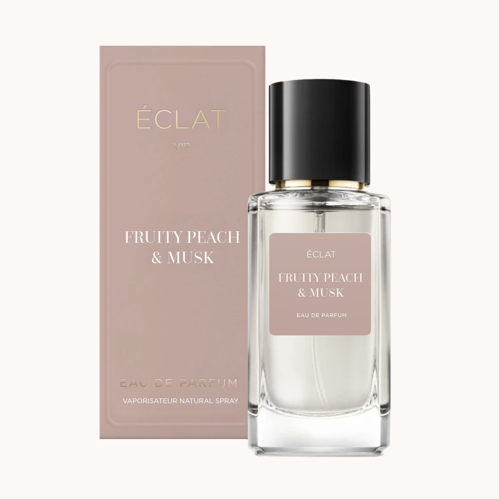 Egy átlátszó üveg ÉCLAT Fruity Peach & Musk fekete kupakkal, mellette egy halvány rózsaszín doboz.