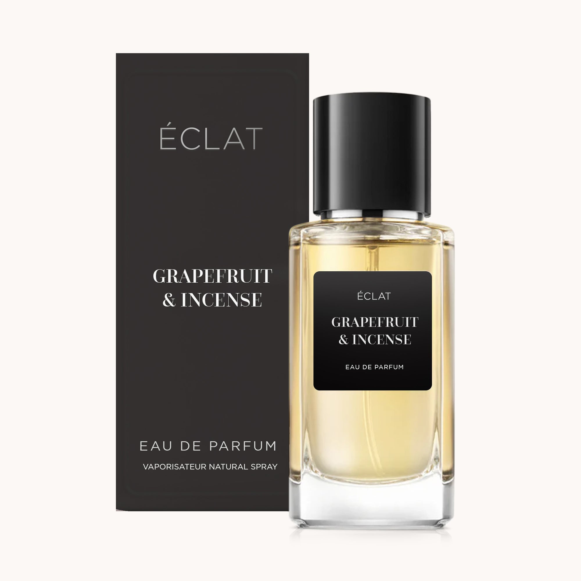 ÉCLAT Grapefruit & Incense perfume bottle with black cap and matching box.