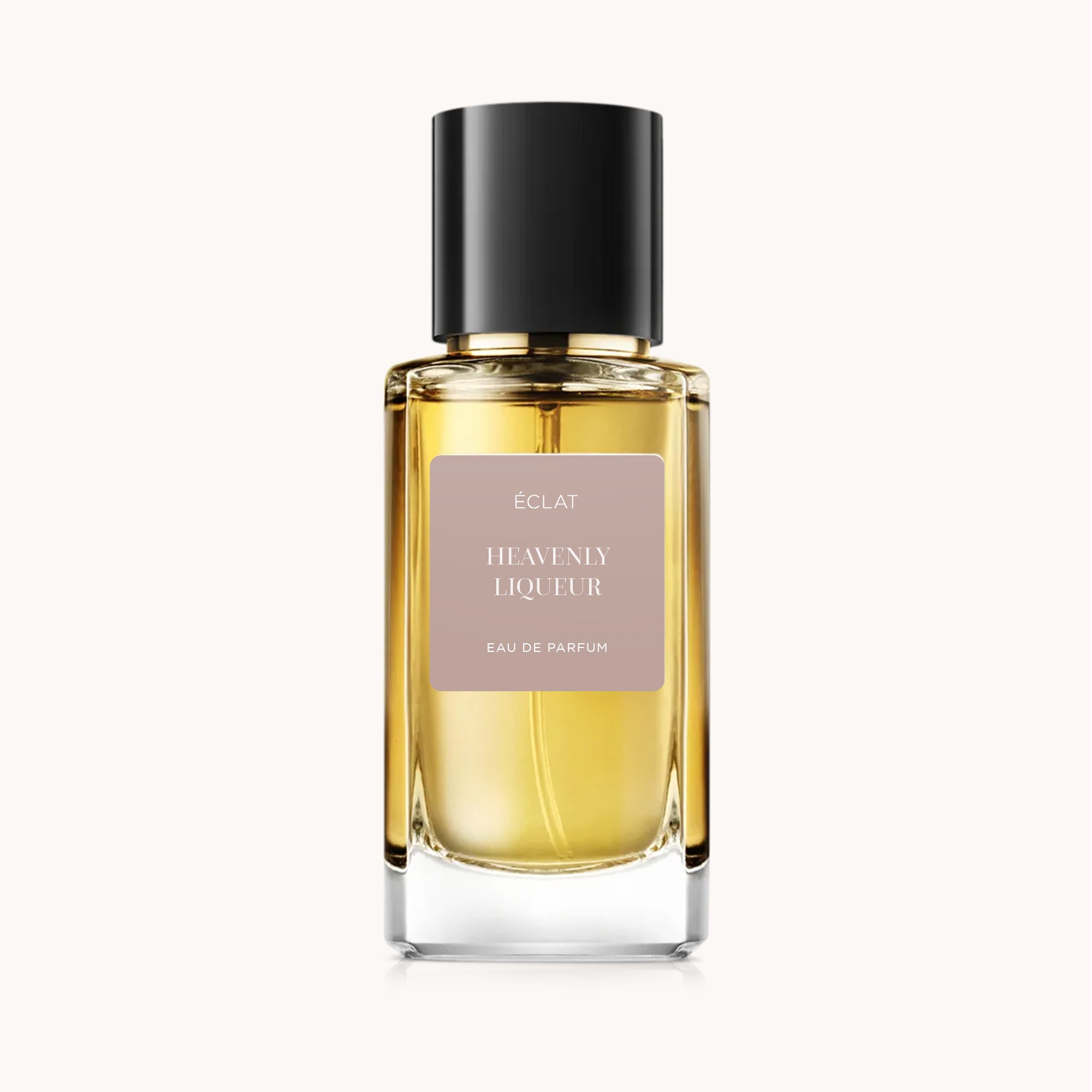 Flacon en verre facetté ÉCLAT Heavenly Liqueur avec un bouchon noir élégant et une étiquette sobre.