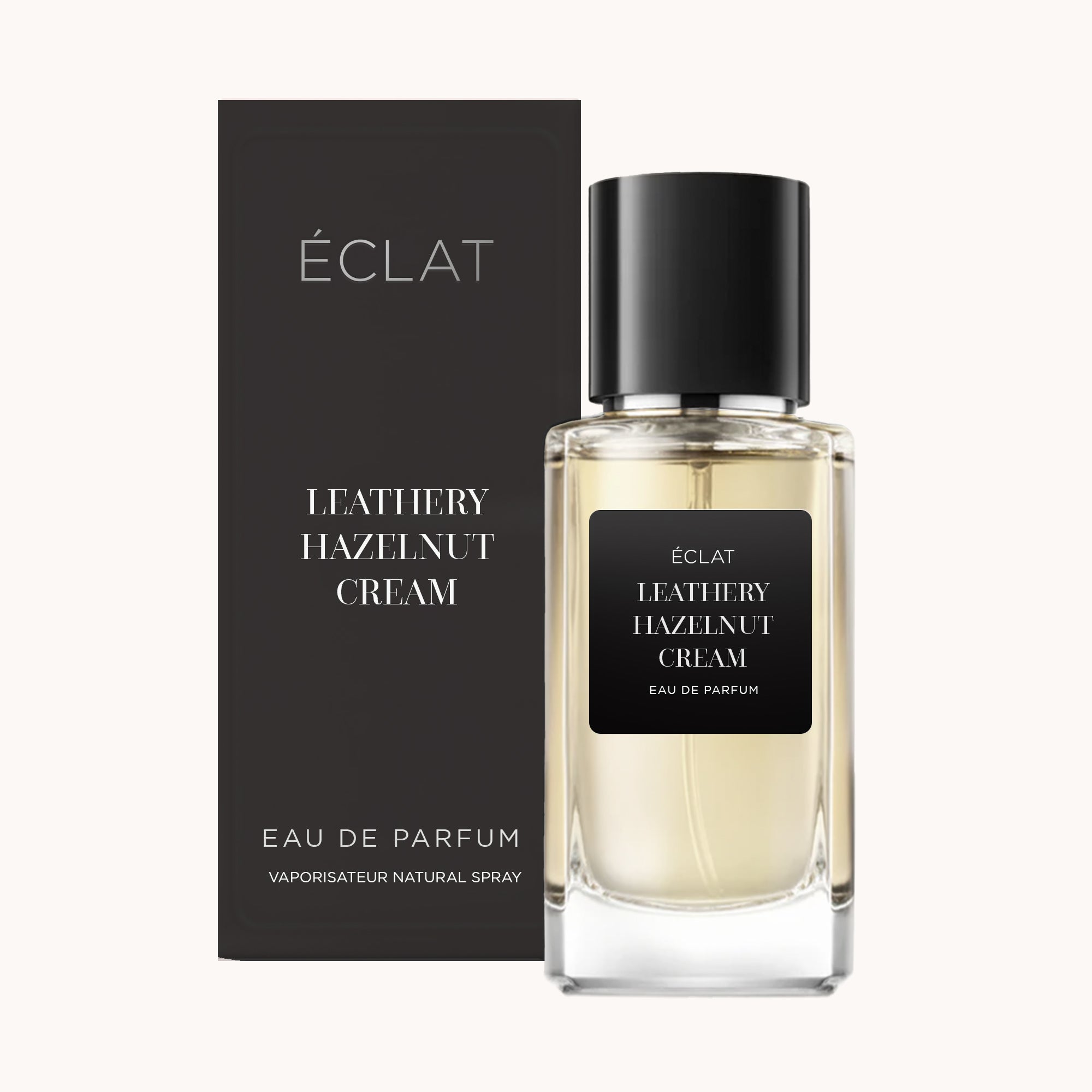 ÉCLAT Leathery Hazelnut Cream em frasco de vidro facetado com tampa preta, posicionado à frente da caixa correspondente.