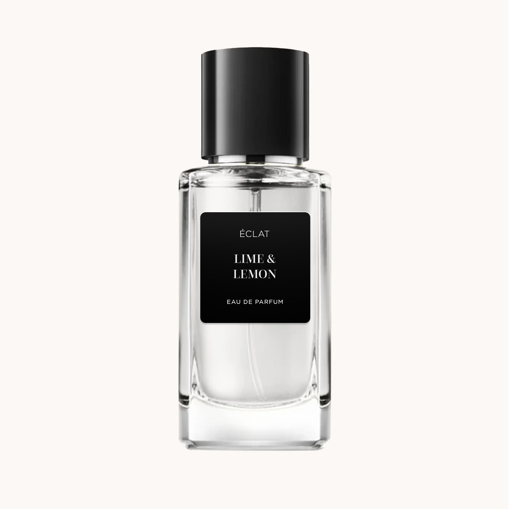 Perfume ÉCLAT Lime & Lemon em frasco de vidro transparente com tampa preta e rótulo preto sobre fundo claro.
