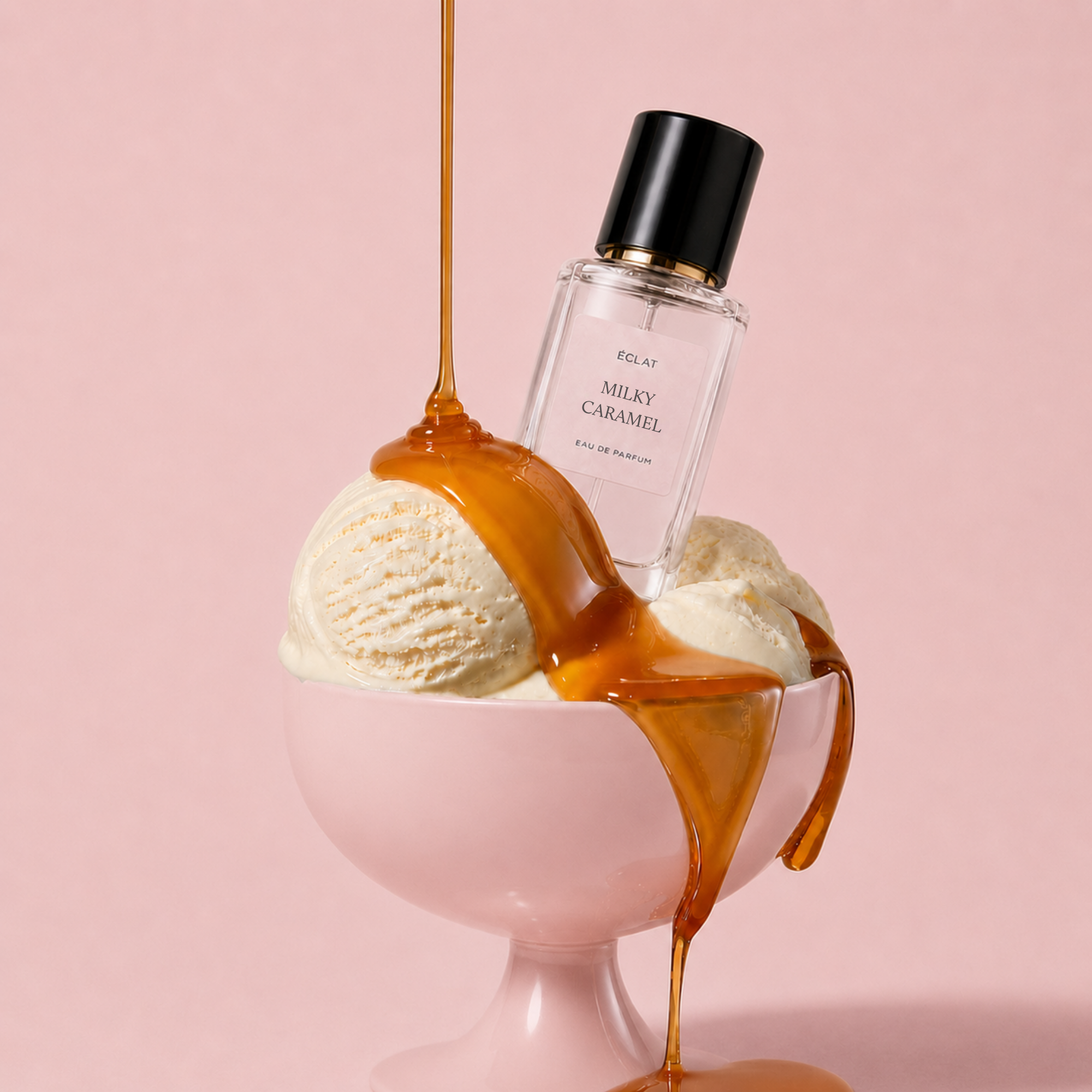A faceted glass bottle of ÉCLAT Milky Caramel resting amidst scoops of vanilla ice cream in a pink dish, drizzled with flowing caramel.