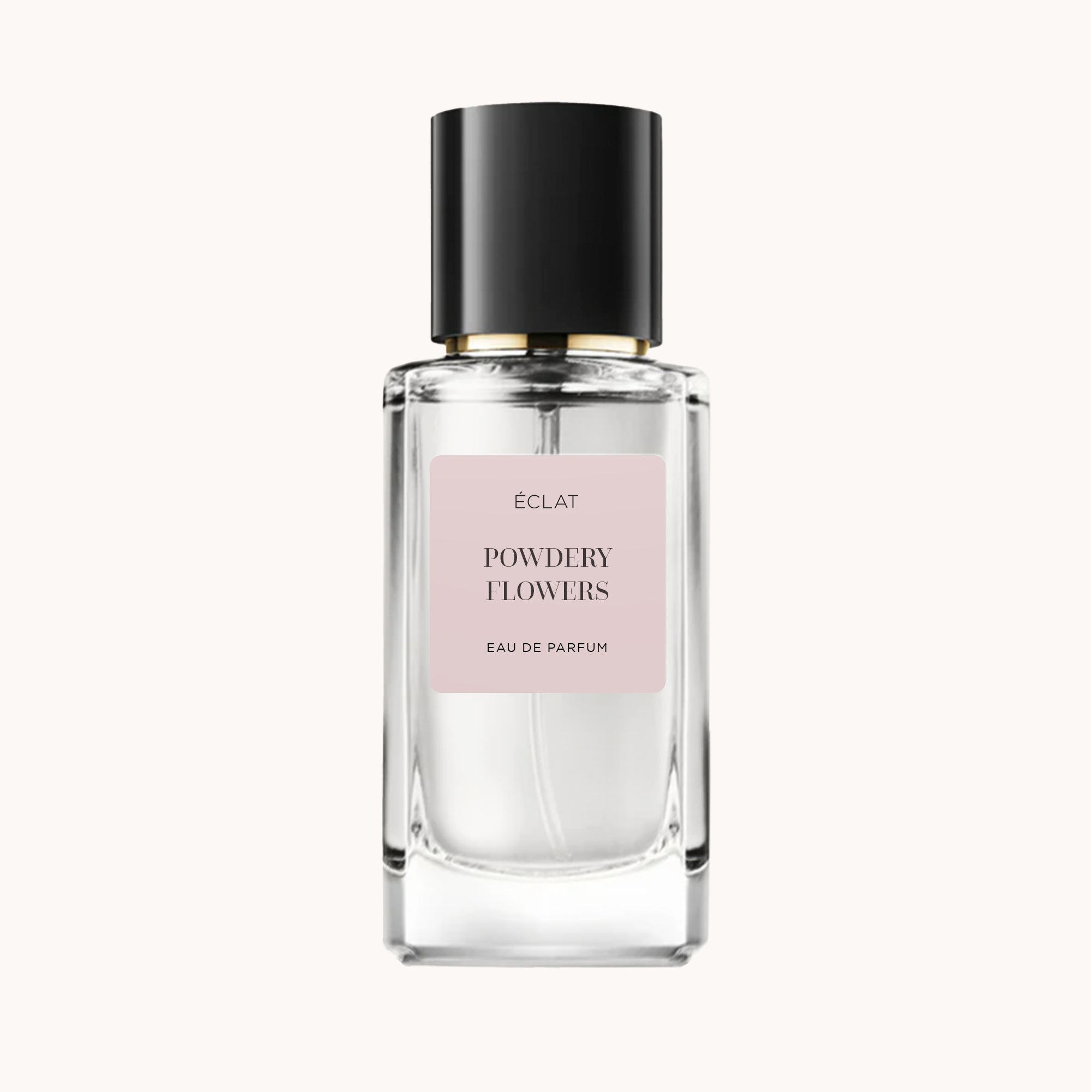 ÉCLAT Powdery Flowers in a clear glass bottle with a black cap and pink label.