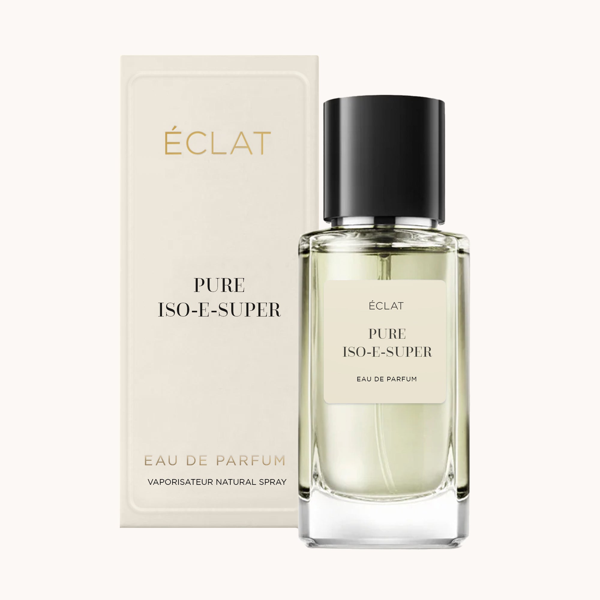 Faceted glass bottle of ÉCLAT Pure Iso-E-Super with a black cap beside its elegant cream-colored box.