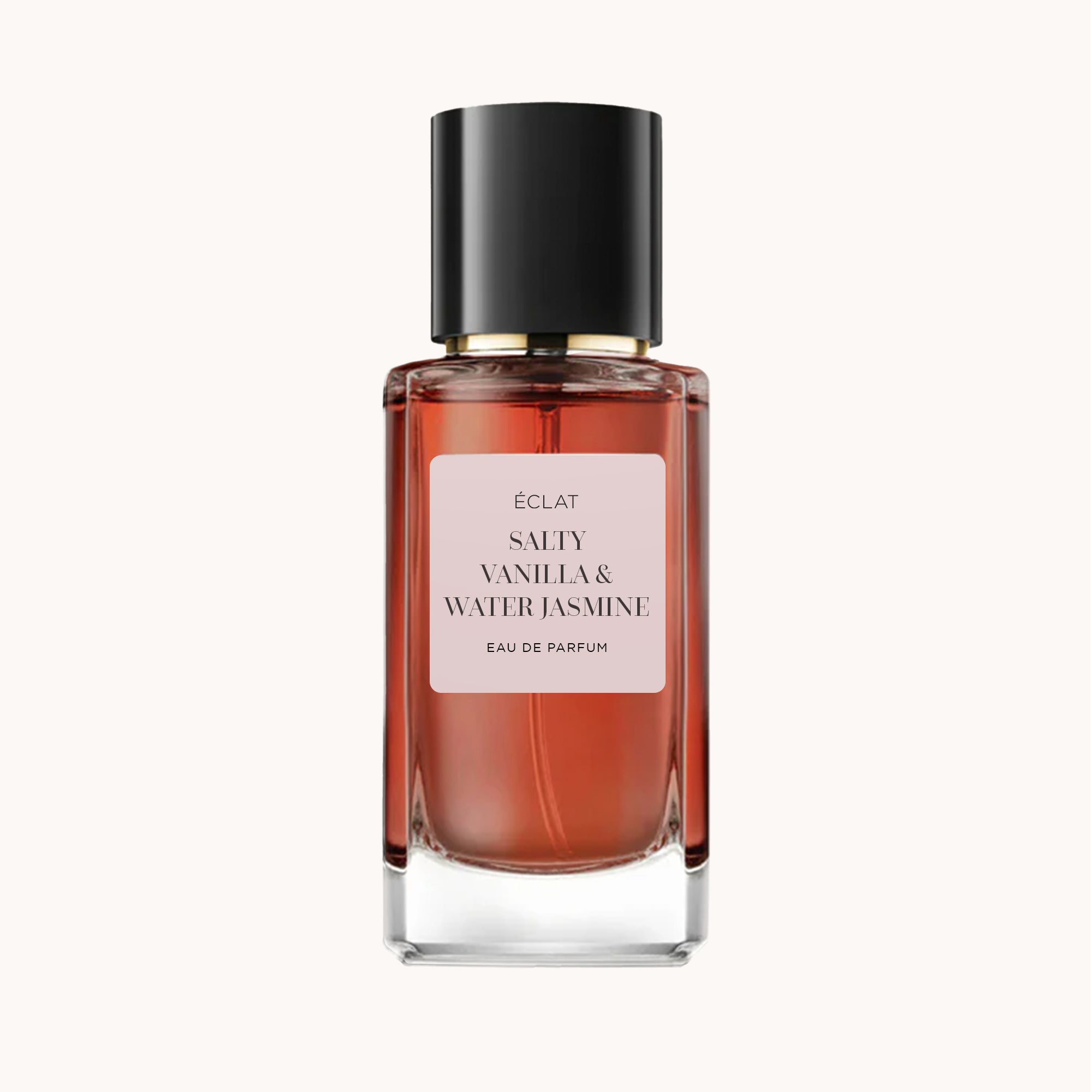 ÉCLAT Salty Vanilla & Water Jasmine σε φιαλίδιο από διαμορφωμένο γυαλί με μαύρο καπάκι.