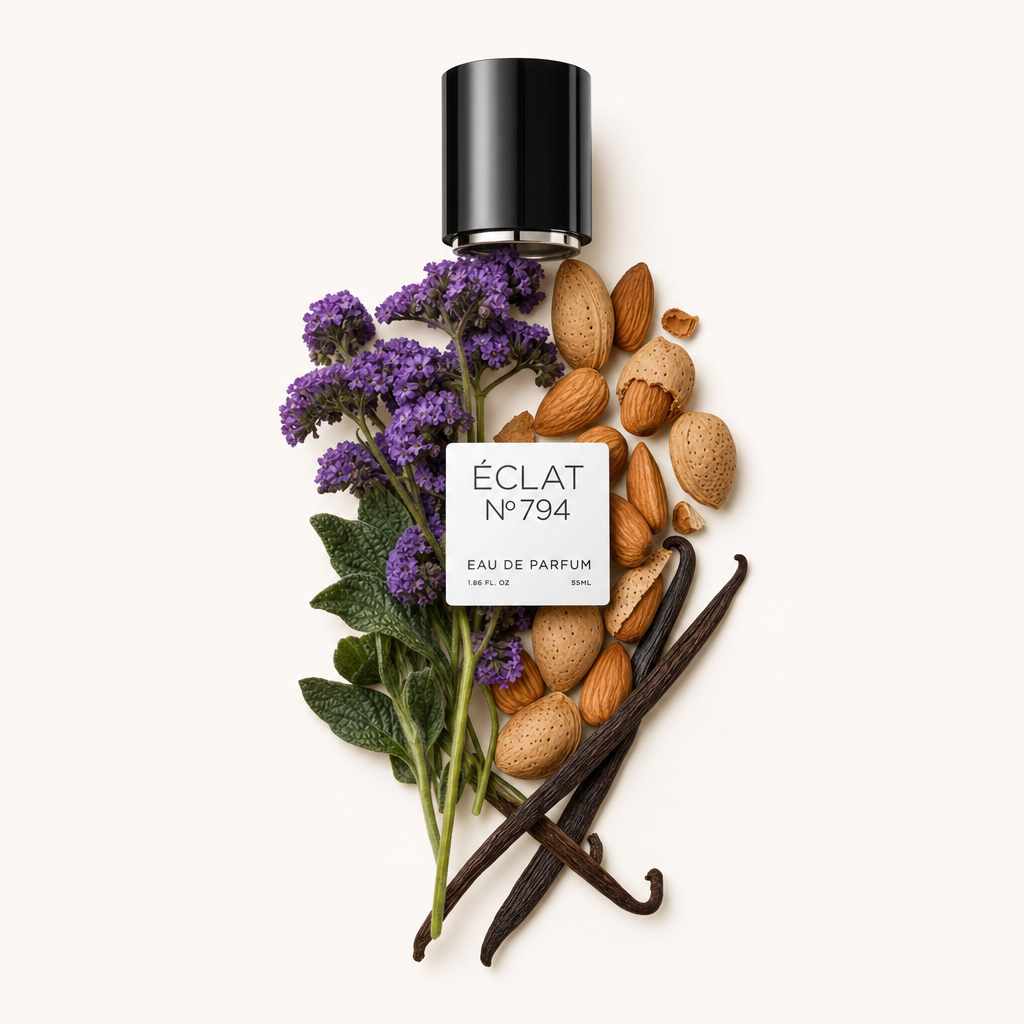 An arrangement of purple flowers, green leaves, whole and shelled almonds, and vanilla pods surrounds a black cap with a label for ÉCLAT Sublime Bitter Almond.