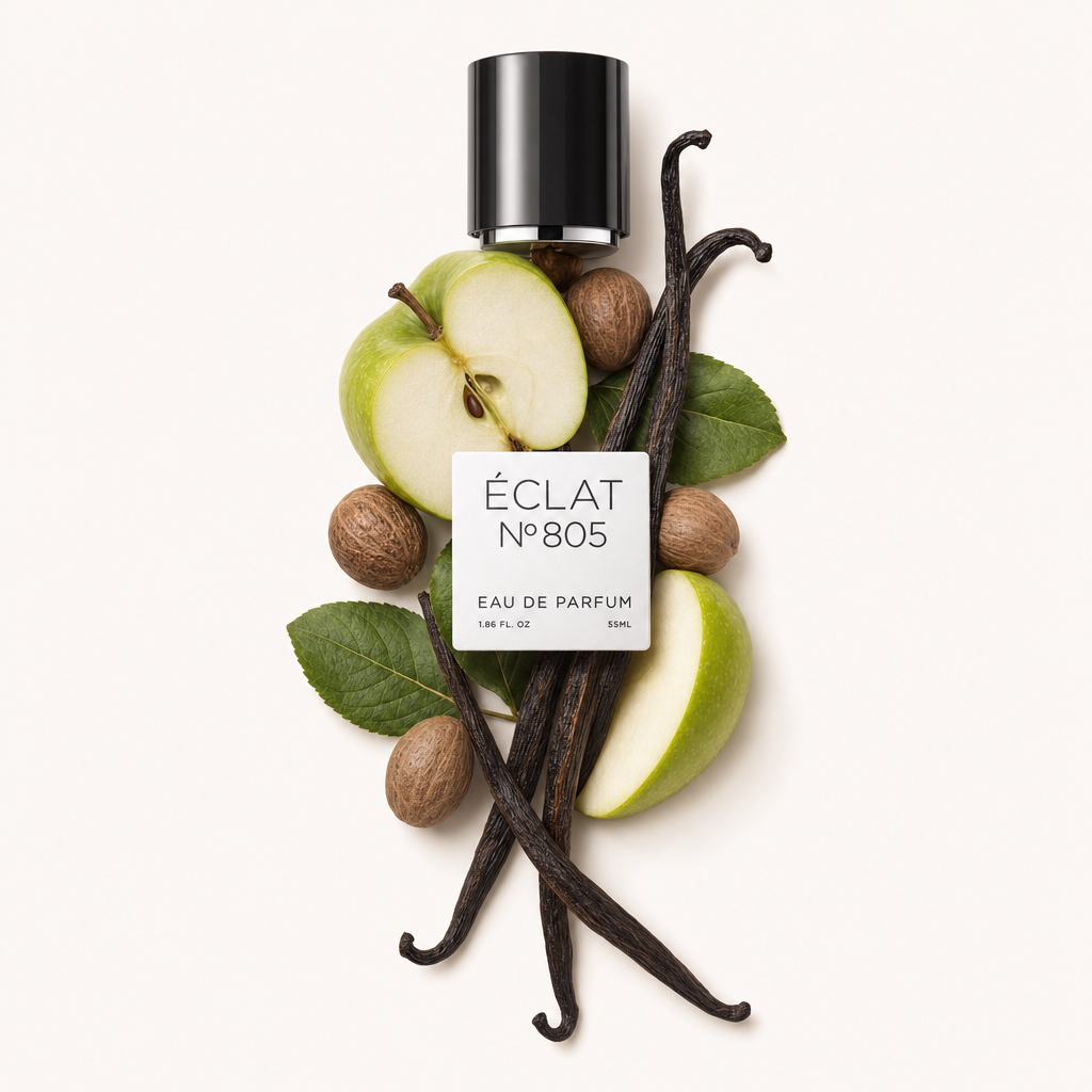 An arrangement of sliced green apples, whole nutmegs, vanilla pods, and green leaves surrounding a black cap with label for ÉCLAT Sweet Nutmeg.