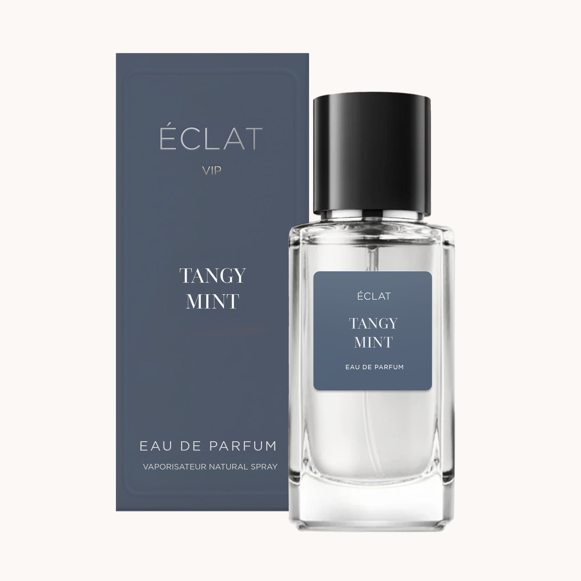 Frasco de vidro facetado de ÉCLAT Tangy Mint VIP com tampa escura, posicionado ao lado de uma caixa correspondente.